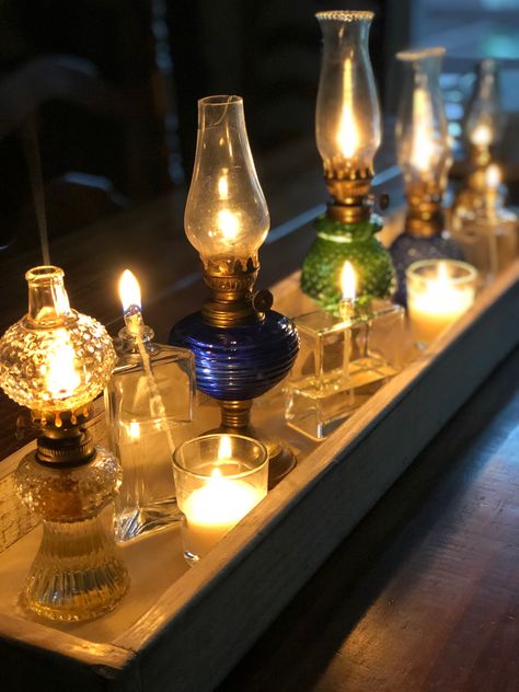 Old Oil Lamps Repurposed, Oil Lamp Collection Display, How To Display Oil Lamps, Small Candle Holders Ideas, Oil Lamp Display Ideas, Oil Lamps Wedding, Oil Lantern Decor Ideas, Vintage Oil Lamp Decor Ideas, Decorating With Oil Lamps