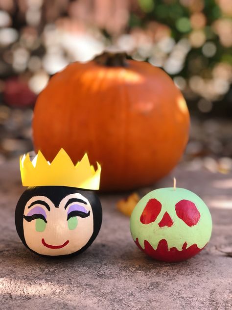 These are actually painted gourds, to look like the Evil Queen and poison apple from Snow White. | Evil Queen Pumpkin | Poison Apple Pumpkin | Painted Disney Pumpkins | Disney Pumpkins Disney Villain Painted Pumpkins, Snow White Pumpkin Painting, Snow White Pumpkin Decorating Ideas, Poison Apple Pumpkin Painting, Easy Pumpkin Painting Ideas Disney, Evil Queen Pumpkin, Poison Apple Pumpkin, Disney Pumpkin Painting Ideas, Snow White Pumpkin