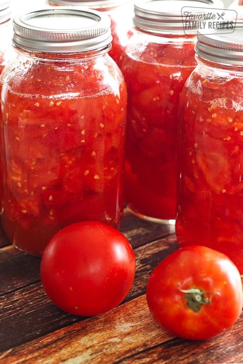 Learn How to Can Diced Tomatoes with this easy recipe and tutorial. It's easier than you think to eat garden tomatoes all year long! Homemade Tomato Juice, Recipes With Diced Tomatoes, Can Diced Tomatoes, Easy Canning, Marinated Cucumbers, Garden Tomatoes, Tomatoes Recipe, Canning Diced Tomatoes, Spiced Pear