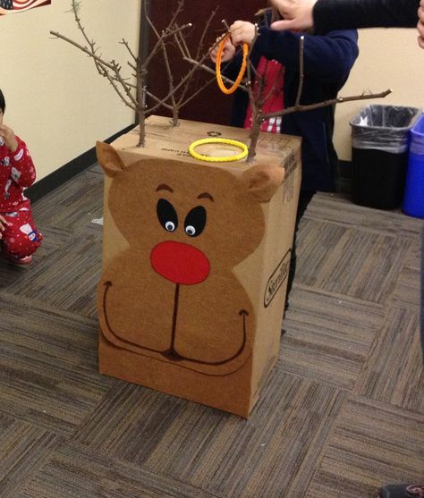 Reindeer Ring Toss (compliments of awesome party mom)! Kindergarten Christmas Party, School Party Games, Classroom Christmas Party, School Holiday Party, School Christmas Party, Christmas Games For Kids, Holiday Party Games, Christmas Kindergarten, Kids Christmas Party