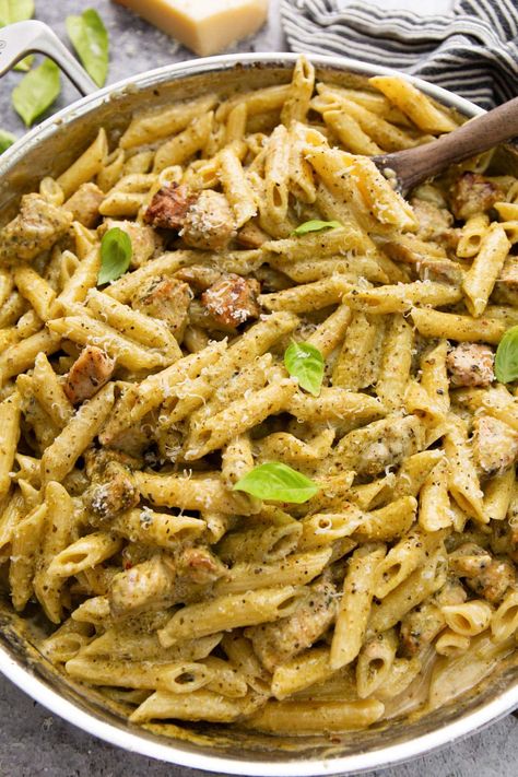 Creamy pesto chicken pasta pairs your favorite pasta with a rich and cheesy sauce bursting with the fresh flavors of garlic and basil pesto. Pesto Pasta Recipes Chicken, Creamy Pesto Chicken, Pasta With Green Beans, Creamy Pesto Chicken Pasta, Basil Pesto Pasta, Creamy Pesto Pasta, Chicken With Italian Seasoning, Pesto Pasta Recipes, Italian Menu