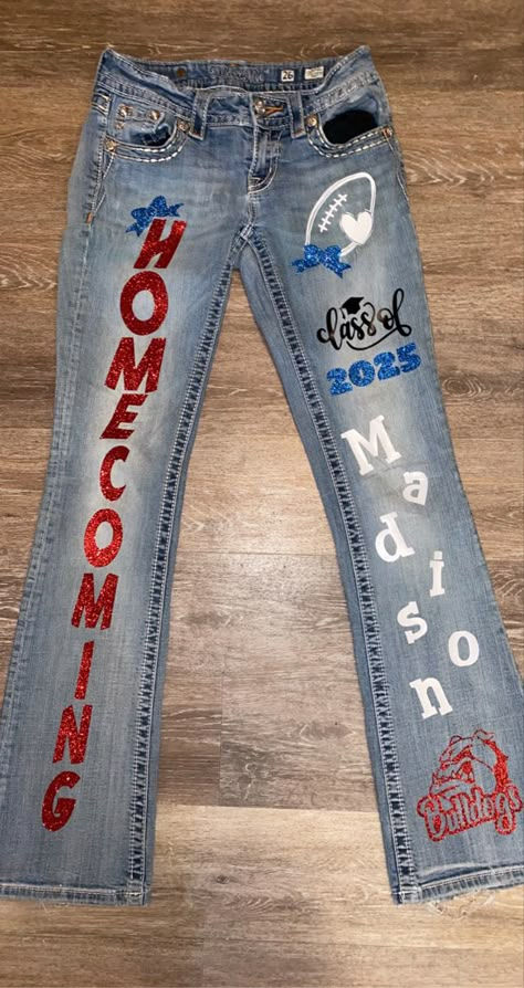 Homecoming Jeans Painted, Hoco Jeans Painted, Homecoming Jeans Ideas, School Spirit Outfit, Senior Painted Jeans, Custom Jeans Diy, Homecoming Mums Senior, School Spirit Week, Homecoming Spirit Week