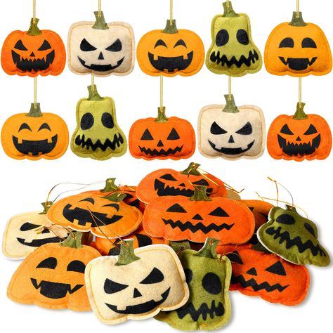 PRICES MAY VARY. Halloween Hanging Decorations: The package contains 24 pcs small sized Halloween pumpkin hanging decorations, providing an ample quantity various decorations, utilize Halloween pumpkin tree ornaments to create delightful Halloween tree ornaments or as part of table decorations, they are a charming visual enjoyment, whether regarded as Halloween felt hangings or as Halloween felt ornaments on the tree Reliable Material: These pumpkin felt tree ornaments are made of non woven fabr Felt Hanging Decorations, Felt Halloween Decorations, Face Ornaments, Halloween Ornaments Diy, Felt Halloween Ornaments, Pumpkin Felt, Halloween Felt Crafts, Pumpkin 3d, Halloween Hanging Decorations