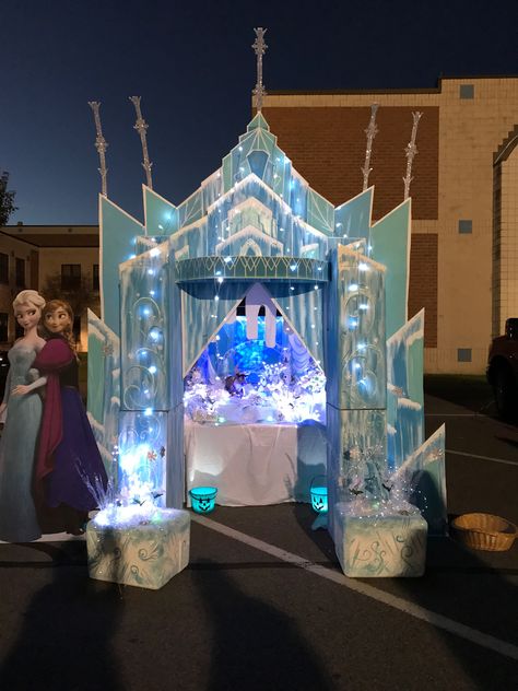 DIY Elsa's castle from Frozen . Trunk or Treat . Great prop for a Photo booth. I made this out of cardboard boxes . I used acrylic paint in various shades of blue, I also melted water bottles to use for the icicles , I went to the Dollar Tree and got various snow flakes and pumpkins that I painted to match the Frozen theme. The front boxes are styrofoam coolers . Great for FROZEN Birthday Party decorations.... Frozen Birthday Party Games, Frozen Photo Booth, Kids Halloween Party Decorations, Frozen Castle, Ice Castle, Frozen Themed Birthday Party, Halloween Party Decorations, Frozen Theme Party, Adult Halloween Party