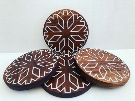 "Thank you for your interest. What you are looking at is a set of 4 handmade, wooden coasters made from walnut and epoxy. 4\" round coasters with a cnc snowflake inlay, filled with white epoxy. Coasters are approximately 3/8\" thick. Finished with odies oil to be water resistant. Cork bottoms included" Epoxy Coasters, Epoxy Inlay, Cnc Ideas, Round Coasters, Cnc Projects, Wooden Coasters, Christmas Winter, Coasters Set, Wood Shop