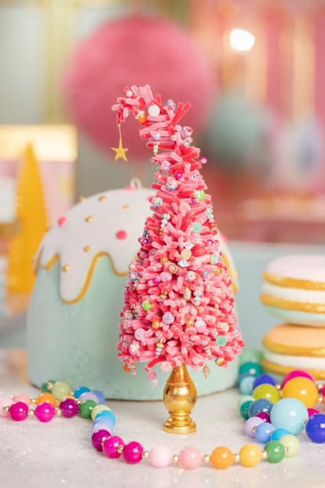 How to Make a Chenille-Stem Tabletop Christmas Tree | HGTV Candyland Ornaments Diy, Glitterville Christmas Diy, Diy Candy Themed Christmas Decorations, Diy Food Ornaments, Pink Ornaments Diy, Diy Whimsical Christmas Decor, Pink Christmas Crafts, Glitter Paper Crafts Diy, Diy Pink Christmas Decorations