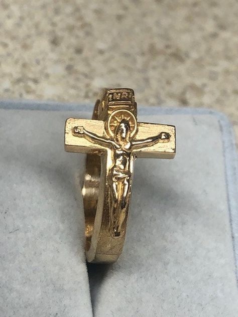 Comes with Certificate of Authenticity. Excellent quality. 14K solid Gold. Stamped 14K. Approximate weight 8 gm (varies with size) Sizes 6-14. 100% satisfaction Guaranteed. Returns accepted within 30 days. If you are unhappy with your purchase for any reason, please don't rush to give negative feedback, simply place the item back in its original box and send it back to us for a full refund. Thank you. Affordable Metal Crucifix Jewelry, Cheap Metal Crucifix Jewelry, Angel Gold Rings, Wedding Rings With Crosses, Luxury Crucifix Jewelry Gift, Cheap Elegant Crucifix Jewelry, Cheap Crucifix Jewelry For Gifts, Cute Cross Rings, Cheap Cross-shaped Rings For Gifts