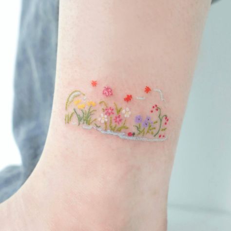 Garden Of Flowers Tattoo, Garden Flowers Tattoo, Flower Bed Tattoo, Floral Garden Tattoo, Gardening Tattoo Ideas, Flower Designs Tattoo, Cute Family Tattoos, Small Colorful Tattoos For Women, Colored Tattoos For Women