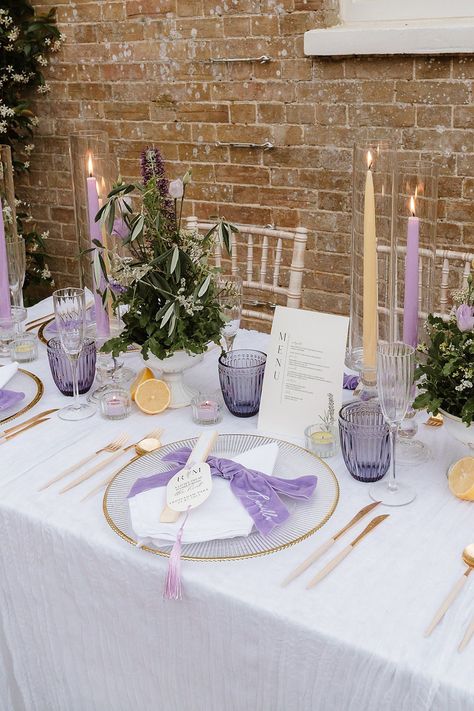 Table Decor Lilac Yellow Candles Flowers Shotesham Park Wedding By Emma Olivia Photography #wedding #weddingdecor Park Wedding Ideas, Lilac Wedding Themes, Purple Wedding Tables, Light Purple Wedding, Dappled Sunlight, Candles Flowers, Candle Table Decorations, Violet Wedding, Yellow Candles