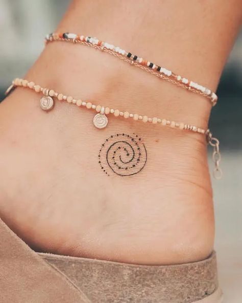 Beautiful Tiny Tattoos, Spiritual Ankle Tattoos For Women, Nordic Tattoos Women, Spiral Ankle Tattoo, Safe Place Tattoo Ideas, Upper Back Neck Tattoo For Women, Tiny Spiral Tattoo, Misneach Tattoo, Ladies Ankle Tattoos