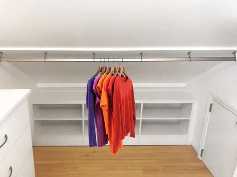 How to Organize a Closet with a Slanted Ceiling for Maximum Storage Slanted Closet Ideas, Attic Closet Ideas Angled Ceilings, Closet With Slanted Ceiling, Angled Ceiling Closet, Slanted Ceiling Closet, Attic Closet Ideas, Slanted Ceiling Bedroom, Loft Closet, Organize A Closet