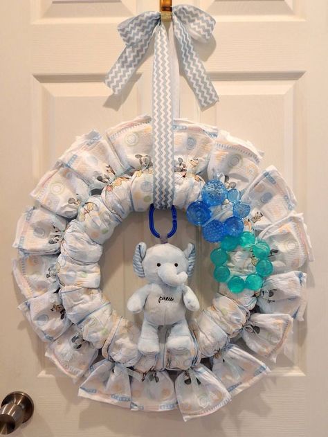 Diaper Wreath! Winter 'Child It's Chilly Outdoors' themed for a good friend&#.... >>> See more by clicking the photo Baby Shower Wreath, Diaper Wreath, Idee Babyshower, Baby Wreath, Boy Baby Shower Ideas, Baby Shower Crafts, Baby Shower Diaper Cake, Cadeau Baby Shower, Baby Shower Brunch