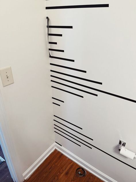 Check out this quick bathroom wall makeover idea for cheap. Renter friendly diy accent wall idea for bathroom or bedroom. #renterfriendly #accentwall Painters Tape Accent Wall Ideas, Easy Washi Tape Wall Art, Washi Tape Wall Design, Tape Art Ideas Wall Decor, Renter Friendly Paint Colors, Diy Cheap Accent Wall Ideas, Accent Wall With Tape Design, Electric Tape Wall Art Diy, Electric Tape Wall Art