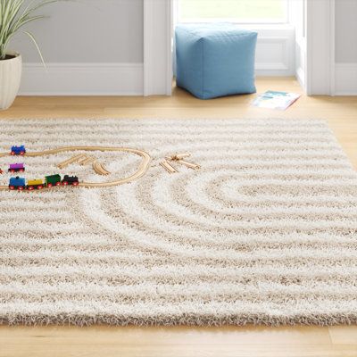 This machine-woven area rug anchors your space in a neutral palette and a modern geometric print. It's power-loomed from polyester, and it showcases a linear pattern with arched detailing in beige and ivory hues. With a thick 2.01" pile height, this plush rug is best for lower-traffic areas like your bedroom or home office. To care for it, simply vacuum it without a beater bar and spot-clean it with water as needed. Rug Size: Rectangle 6'7" x 9'6" | White 114 x 79 x 2.01 in Area Rug - Wade Logan Neutral Plush Rug, Neutral Rug Nursery, Kids Rugs Bedroom, Nursery Rug Ideas, Neutral Nursery Rug, Girl Nursery Rug, Boho Nursery Rug, Nursery Rugs Neutral, Realistic Bedroom