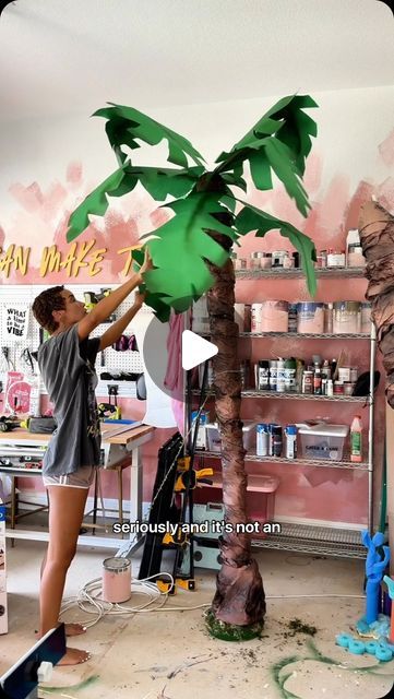 RAVEN ELYSE on Instagram: "DIY giant paper palm trees! 🌴 The perfect party prop for any beachy themes! #beachpartydecor #islandpartydecor #summerpartydecor #diypartydecor" Hawaiian Decorations Party, Surfboard Diy Decor, Diy Hawaiian Decorations, Hawaiian Props, Island Theme Party Decorations, Diy Palm Tree Decorations, Diy Hawaiian Party Decorations, Diy Luau Party Decorations, Jungle Theme Crafts