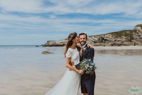 Lusty glaze wedding in newquay, north Cornwall, Cornwall wedding, cornish wedding, beach wedding, coastal wedding, blue bridesmaids, two piece wedding dress, sandy wedding, flipflop wedding, wedding in cornwall, blue themed wedding, beach huts, mustard tie, shorts suit, groom in shorts, shorts on wedding day, bride and groom kiss on beach. Beach wedding photos Uk Beach Wedding, Groom In Shorts, Treseren Wedding, Clifftop Wedding, Lusty Glaze, Cornish Wedding, Witch Wedding, Wedding Groomsmen Attire, Wedding Coastal