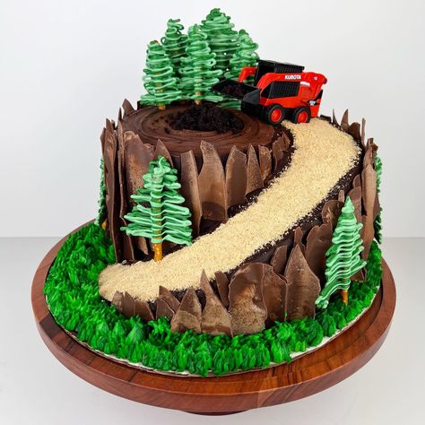 Skid Steer / Tree Stump Cake! Chocolate cake layers with Nutella buttercream encased in a chocolate buttercream. Decorated with chocolate bark and a candy melt trees. Skid Steer Birthday Cake, Buttercream Trees On Cake, Skid Steer Birthday Party, Skid Steer Cake, Buttercream Trees, Atv Cake, Tree Cake Decoration, Moto Cake, Hiking Cake