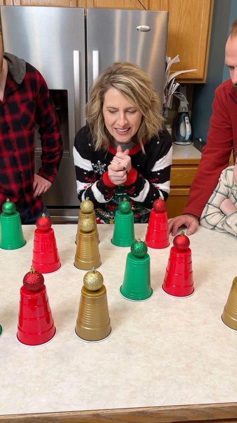 What's Under the Cup -- Family Game 🥤 | What's Under the Cup -- Family Game 🥤 Mom, Dad, and family play a fun Christmas cup roulette with some awesome prizes. Fun idea for Holiday gatherings.... | By Peter B | Facebook Christmas Present Games Family, Fun Family Christmas Gift Exchange Ideas, Cup Game Prizes, Christmas Punch Out Game, Christmas Prize Ideas, Door Prizes For Christmas Party, Christmas Plastic Wrap Ball Game, Christmas Hosting Ideas Fun Games, Christmas Games With Red Solo Cups