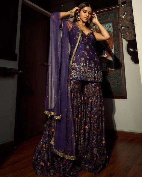 Pranutan Bahl Sexy Glossy Outfits AndLooks Check more at https://www.k4fashion.com/pranutan-bahl-outfits/ Purple Sharara, Printed Sharara, Dupatta Style, Sharara Pants, Polki Earrings, Indian Couture, Dupion Silk, Sharara Set, Indian Clothing