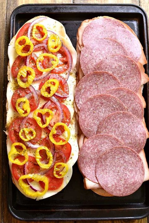 This Baked Italian Party Sub is perfect for feeding a crowd! Loaded with the delicious flavors of salami, turkey, ham, provolone, tomatoes, peppers, red onions, and homemade Italian vinaigrette, this sandwich is party-ready whenever you are....and guaranteed to make all your guests very happy! Italian Loaf Sandwiches, Appetizers For Party Crowd Pleasers, Awesome Sandwiches, Italian Subs, Italian Vinaigrette, Party Crowd, Light Summer Meals, Sub Sandwich, Best Sandwich Recipes