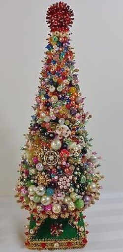 This is a beautiful vintage handmade Christmas Tree. The base is Styrofoam covered jewelry. Made of brooches, necklace beads, earrings. From a lovely estate. It is 15 1/2 tall, 6 wide at the widest Jewelry Christmas Tree Diy, Costume Jewelry Christmas Tree, Cone Costume, Pins Necklace, Jewelry Bouquet, Jewelry Trees, Old Jewelry Crafts, Costume Jewelry Crafts, Jeweled Christmas Trees