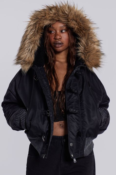 Designed in collaboration with Schott NYC, this piece is part of an ultra-limited edition. Crafted from the original Schott fabrics, it features a slightly cropped body and a faux fur trim hood for refined sophistication. Finished with distinctive details like a zip split hood, short pile borg lining, and antique silver hardware, this timeless jacket will leave its mark. Designed in collaboration with Schott NYC Very limited edition Adapted from the iconic Schott JKT51 hooded jacket Original Sch Jackets With Fur Hood, Aesthetic Winter Jacket, Pretty Jackets, Timeless Jacket, Faux Fur Outfit, Fur Hood Jacket, Black Jet, Fur Leather Jacket, Jaded London