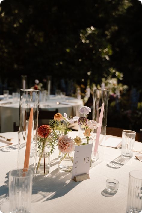 Centerpieces With Taper Candles, Table Bud Vases Wedding, Tiny Vase Centerpiece Wedding, Bud Vases For Wedding Tables, Single Bud Vase Centerpiece Round Table, Flower Buds Centerpiece, Single Bud Vases Wedding Centerpiece, Bid Vases Wedding, Colorful Bud Vases And Candles