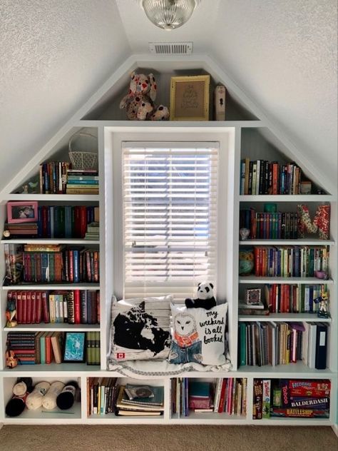 Slanted Ceiling Library, Bonus Room Bookshelves, Slanted Wall Bookshelf, Attic Shelves Slanted Walls, Dormer Bookshelves, Attic Bookshelf, Attic Library Ideas, Attic Bookshelves, Aesthetic Book Nook