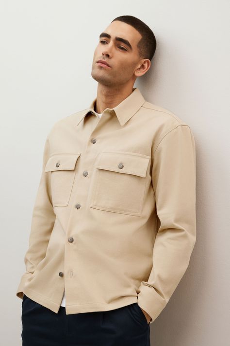 The perfect combination of a shirt and a jacket, this twin pocket workwear-inspired shacket is crafted from pure cotton with a pointed collar and a button-up fastening. 100% Cotton. Mens Shacket, Beige Shirt, Fitted Shirts, Cool Outfits For Men, Men's Shirts, Clothing Styles, Mens Clothing, Mens Clothing Styles, Favorite Things List