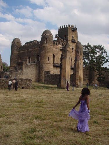 The Fasil Ghebbi Castle also called the Camelot of Africa. Located in the country of Ethiopia. This is NOT a slave castle and was NOT designed and built by European people NOR Arab people.The most prominent of several castles in the fortress-city of Fasil Ghebbi in Gonder, known dreamily as the Camelot of Africa, Fasilides Castle is named after the Ethiopian Emperor who had it built during the Mid 17th century. Gonder is home to several other castles, including those of Yohannes and David II... Africa Bucket List, Oromo People, Ethiopian People, European People, African Women Art, Black Royalty, Fantasy Places, Beautiful Places To Travel, 17th Century