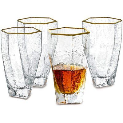 Featured with old-fashioned hexagon shape hammered pattern, make these elegant drinking glasses super stars on your table. Hand blown by skilled artisans, each piece is unique and timeless. | LFA Hammered Hexagon Tall Trumpet Gold Rim Highball Glass Set Of 4, 13.7 Oz Glass in Yellow, Size 5.63 H x 3.54 W in | Wayfair Crystal Whiskey Glasses, Glass Cup Set, Drinking Glass Sets, Bourbon Cocktails, Rum Cocktail, Bar Gifts, Highball Glass, Bar Glassware, Drinking Glass