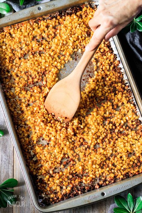 Learn how to make oven roasted kernel corn, which uses fresh sweet corn on the cob.  This easy recipe uses pantry staples like olive oil, spices, and lime juice to make a Mexican side dish that can be used for tacos, salad, or dips. Roasted Corn For Tacos, Oven Roasted Mexican Corn, How To Roast Corn In The Oven, Roasted Canned Corn, Roasted Corn In The Oven, Roasted Mexican Corn, Roasted Corn Kernels, Tacos Salad, Roast Corn