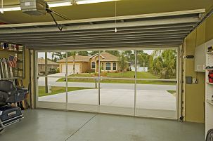 An easy way to turn your garage into a breezy workshop or even a place for the kids to play....i sooooo would really like one of these Garage Screen, Garage Playroom, Garage Screen Door, Diy Screen Door, Garage Floor Paint, Deco Panel, Garage Door Makeover, Garage Remodel, Garage Shed