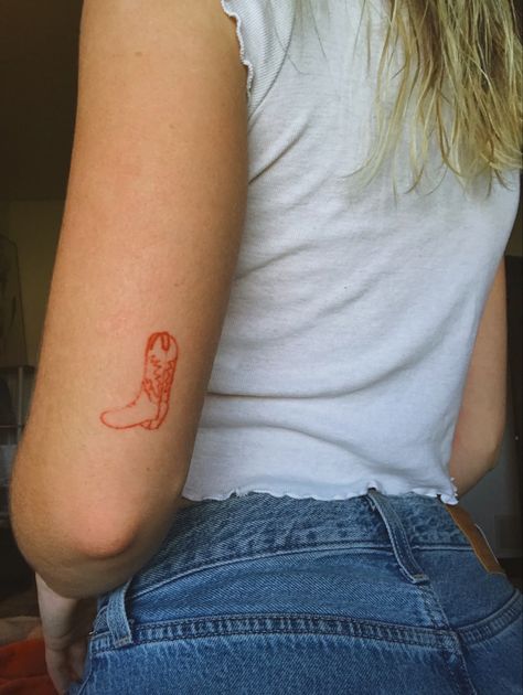 Red cowboy boot tattoo, cute red ink tattoo, friend matching tattoo Red Cowgirl Boot Tattoo, Red Cowboy Boots Tattoo, Cowboy Boot Tattoo Placement, Cowboy Boot Tattoo Ankle, Cowboy Boot Flowers Tattoo, Disco Cowboy Tattoo, Red Cowboy Boot Tattoo, Cowboy Boot Tattoo For Women, Boot Tattoos For Women