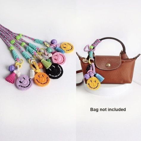 Add some charm to your Longchamp bag with our Smiley Face Bag Charm. This handy accessory can be used as a bag charm. Choose from various colors to match your style. Unique and fashion bags charm accessory. Suit for many occasions. Unique and casual bag charm. Trendy backpack keyring accessories Bag charm material: fabric, alloy metal spring rings, jingle bell End to end length: approx. 31cm. Bags and other accessories not included.  HOW TO CHOOSE THE BEST BAG STRAP LENGTH lsleather.com.au/blogs/news/how-to-choose-the-best-bag-strap-length MAKE YOUR OWN BAG CHAIN STRAP - EASY DIY GUIDE https://lsleather.com.au/blogs/news/customise-your-bag-with-a-chic-chain-strap-easy-diy-guide FOLLOW US ON SOCIAL MEDIA FOR EXCLUSIVE DEALS [Website - www.lsleather.com.au] [Pinterest -  https://www.pinteres Trendy Keychains, Keyring Accessories, Longchamp Mini, Longchamp Bag, Trendy Backpacks, Charm Collection, Accessories Bag, Backpack Charm, Phone Charms