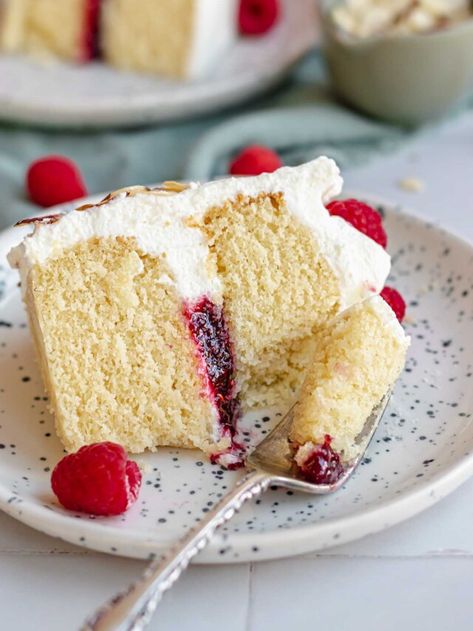 Soft Almond Cake with Raspberry Filling – The Cozy Plum The Cozy Plum, Raspberry Filled Cake, Almond Cake With Raspberry Filling, Raspberry Almond Cake, Raspberry And Almond Cake, Whipped Cream Cheese Frosting, Swiss Rolls, Raspberry Almond, Raspberry Filling