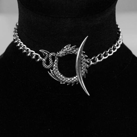 You’re a total badass in this sick choker necklace that has a thick chain construction, a dragon, snake, and crescent detailing. Moon Choker Necklace, Moon Choker, Pagan Jewelry, Magical Jewelry, Dragon Jewelry, Unisex Necklace, Dragon Pendant, A Dragon, Fantasy Jewelry