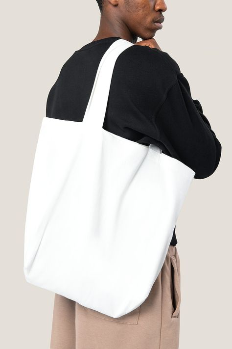 Download free image of Man carrying white tote bag studio shoot by Teddy about tote bag mockup, tote bag, black canvas bag, white shopping bag mockup, and bag mockup 2723619 Tote Bad, Black Canvas Bag, Tote Bag Mockup, Upcycled Bag, Simple Tote, Men's Totes, Free Tote, White Tote Bag, Bag Mockup