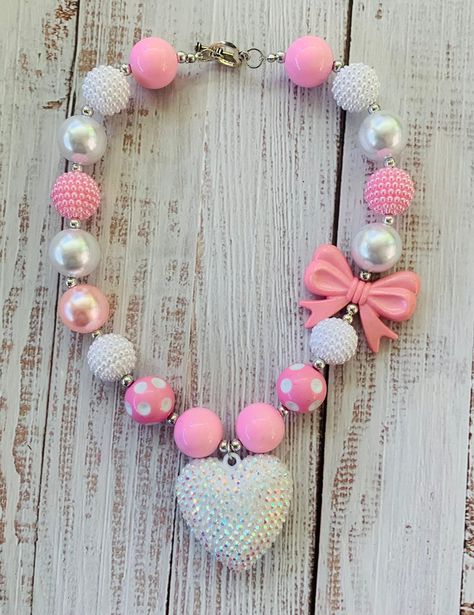 Bubblegum Chunky Necklaces for every outfit! These come adorned with your favorite princess! Pair these with your favorite 2pc. or dress and you are ready to rock the day! Material: Acrylic beads, 20mm, Length is 40cm The Blushing Honey Boutique is a local USA owned store located in Tampa, Fl. Bubble Gum Bead Bracelet, Bubble Gum Beads Keychain, Bubblegum Necklace Ideas, Bubble Gum Earring, Bubblegum Jewelry Chunky Beads, Clay Bracelets, Chunky Necklaces, Bubblegum Necklace, Polymer Clay Bracelet