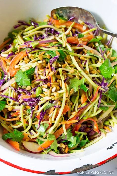 Crunchy Asian Slaw Recipe with Peanut Dressing - A Spicy Perspective Crunchy Asian Slaw, Asian Slaw Recipe, Shelled Edamame, Summer Slaw, Slaw Salad, Vegan Coleslaw, Liquid Aminos, A Spicy Perspective, Slaw Recipe