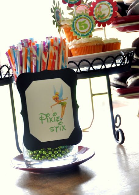 Peter Pan Birthday Party by Oh Snap! | HoneyBear Lane Peter Pan Birthday Party, Pixie Stick, Peter Pan Birthday, Peter Pan Party, Pixie Sticks, Peter Pan And Tinkerbell, Disney Birthday Party, Tinkerbell Party, Disney Theme Party