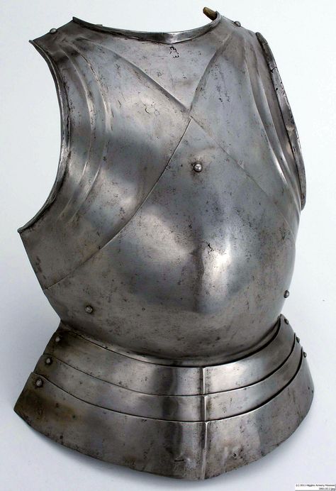 Breastplate "in the German style" Northern Italy (Milan), about 1480, steel; modern leather, the domed rivet in the center slides in a slot on the chest plate, allowing the wearer to flex his torso forward. The lipped edges at the neck and arms help deflect the points of weapons.   Weight: 6 lb. 4 oz.  Length: 14" W x 21" L x 7" D. Knight Chest Plate, Metal Chest Plate, Chest Plate Armor, Knights Armour, 15th Century Armor, Metal Chest, Metal Armor, Plate Armor, Chest Plate