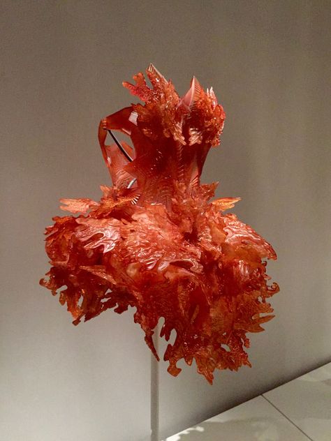 Iris van Herpen DRESS, Autumn 2012, haute couture 3-D-printed (stereolithography) dark orange epoxy by Materialise, hand-sanded and hand-sprayed with a technical transparent resin Manus X Machina Fashion, Iris Van Herpen Couture, Manus X Machina, Boston Interior Design, Sculptural Fashion, Iris Van Herpen, Transparent Resin, Chihuly, Residential Interior Design