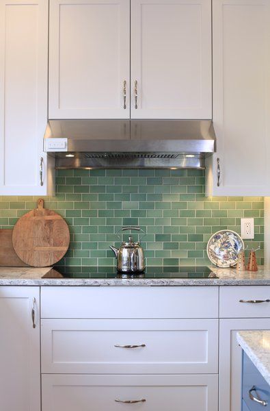 Kitchen, Recessed Lighting, White Cabinet, Range Hood, Cooktops, and Subway Tile Backsplashe 25 Backsplash Ideas For Your Kitchen Renovation - Photo 25 of 25 - Green Kitchen Backsplash, Green Tile Backsplash, Light Green Kitchen, Cabinet Layout, Modern Kitchen Backsplash, Backsplash Tile Design, Designer Photography, Green Backsplash, Subway Tile Kitchen