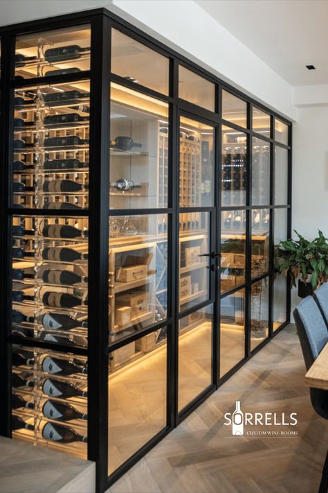 A Sorrells wine room with a black frame and door to finish Cave A Vin Design, Wine Cellar Wall, Wine Room Design, Glass Wine Cellar, Wine Closet, Legend Homes, Wine Cave, Bar Sala, Home Wine Cellars