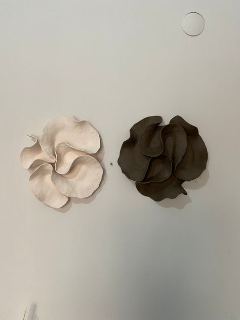 I used brown and beige ceramic clay when creating my product. They are single fired and unglazed products. That's why it has a matte and textured surface. When you touch the products, you will feel the notches on the surface. It was cooked at 1080 degrees. The inspiration for my product, which is completely handcrafted, is the corals in the sea. If you want to see and feel the texture of mud in its raw form on your walls, this product may be just for you. The back of the product is designed to help you easily hang it on the wall. You can attach it to your wall with the help of a strong nail. Product dimensions are approximate brown statue diameter: 35cm beige statue diameter: 35cm Please review my store policies before purchasing the item. Diy Clay Wall Hanging, Ceramics Wall Art, Clay Lamps, Abstract Ceramics, Pottery Wall Art, Wall Art Ceramic, Ceramic Wall Planters, Clay Wall Hanging, Ceramic Wall Sculpture