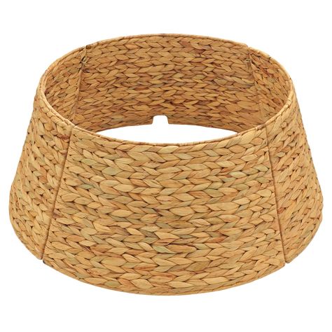 PRICES MAY VARY. BEAUTIFUL DESIGN with woven water hyacinth. This tree collar is perfect for your Christmas tree or any tree with a seasonal style CORD CUT-OUT allows you to effortlessly manage cords, ensuring they remain tidy and discreet while maintaining a flawless look for your living space throughout the holiday season FIT MANY STANDS & TREES: With a 24-inch diameter, this collar will fit up to 23-inch tree stands and 4ft - 8ft trees. Before selecting the collar, be sure to measure your tre Xmas Tree Collar, Wicker Christmas Tree, Wicker Christmas Tree Skirt, Wicker Tree Skirt, Christmas Tree Ring, Box Christmas Tree, Christmas Tree Collar, Tree Basket, Christmas Collar