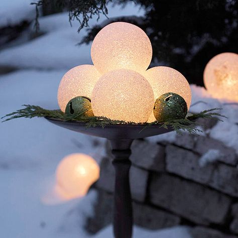 Glowing Holiday Globes  Glowing frosted globes (available in large and small sizes from home-improvement stores) take the edge off a chilly ... Best Outdoor Christmas Decorations, Jul Diy, Outdoor Holidays, Outdoor Holiday Decor, Outdoor Christmas Lights, Toy Shop, Decorating With Christmas Lights, Magical Christmas, Outdoor Christmas Decorations