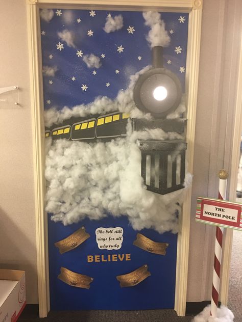 We are having a Christmas door decorating contest at work 🚂 I just finished my door, The Polar Express is my favorite movie.   Credits: Pinterest for the idea, Dollar Tree for glitter snowflake stickers, black foam board & poster board, Walmart for black spray pain, styrofoam, spray snow & touch light, Hobby Lobby for poly-fill & blue wrapping paper. Holiday Movie Door Decoration, Door Competition Decorating Ideas Christmas, Door Christmas Decorations Contest, Winter Themed Door Decorations, Winter Wonderland Door Contest, Starwars Christmas Door Decorations, Award Winning Christmas Door Decorations, Christmas Door Decorations Polar Express, Decorate Office For Christmas Cute Ideas