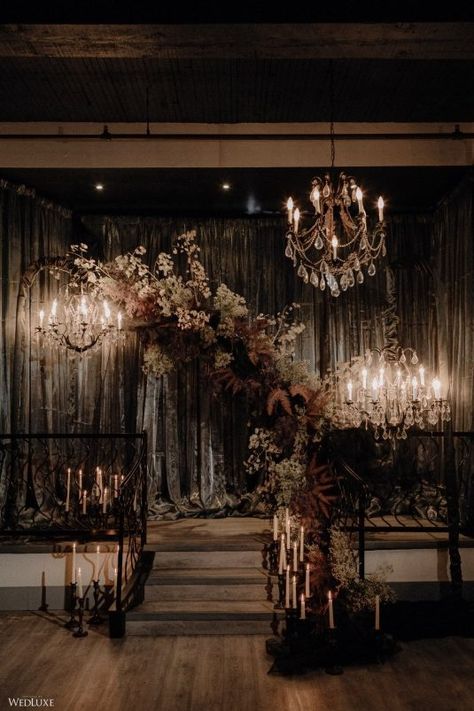 #wedluxe #wedluxemagazine #decor #wedding #chandeliers #dark #moody #goth Gothic Wedding Ceremony, Dark Academia Wedding, Moody Wedding Decor, Dark Romantic Wedding, Gothic Wedding Theme, Vampire Wedding, Dark Wedding Theme, Wedding Ceremony Decor, Modern Gothic